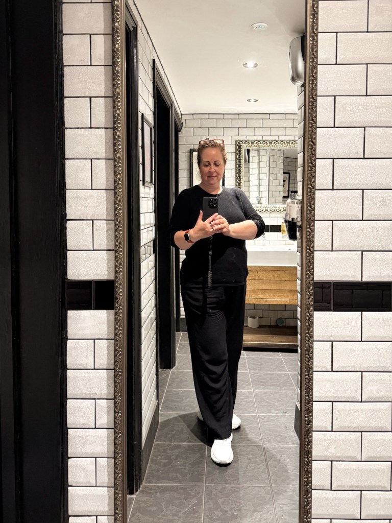 Charlotte taking a selfie in the The Blackbird Pub in Earl's Court